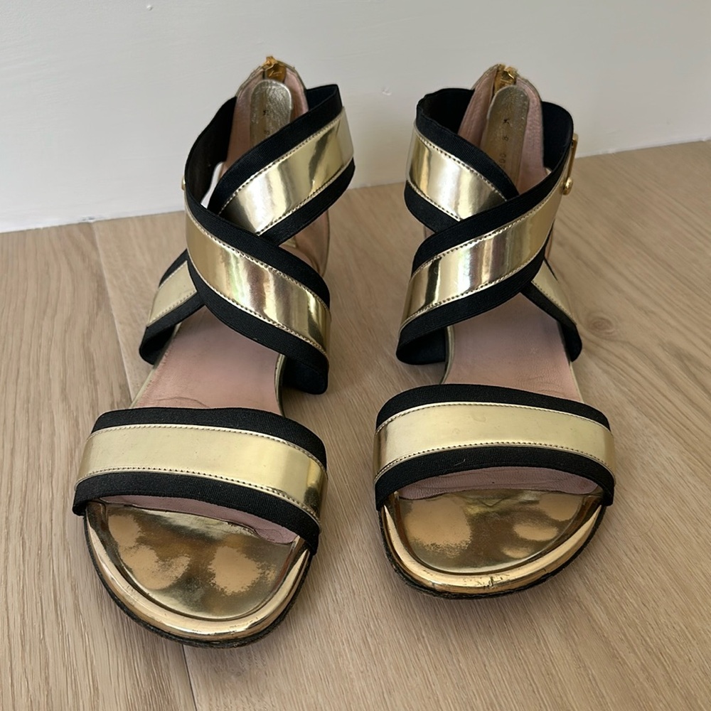 Stuart Weitzman black and gold cross cross sandals